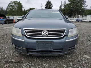 2005 Volkswagen Phaeton z VIN WVWAF03D758003746, wystawiony jako Copart lot #57449525 z przebiegiem 177 257 mil mil oraz Szkoda całkowita • Salvage title. Historia ofert i sprzedaży dostępna na DreamBid. Obrazek 5.