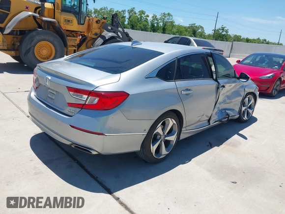 2019 Honda Accord Touring z VIN 1HGCV2F99KA002506, wystawiony jako IAAI lot #42233936 z przebiegiem 88 612 mil mil oraz . Historia ofert i sprzedaży dostępna na DreamBid. Obrazek 4.