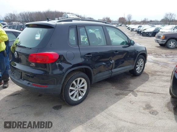 2018 Volkswagen Tiguan with VIN WVGBV7AX3JK002325, listed as a IAAI auction lot 41960059 with 57,619 mi miles and . Bid and sale history available at DreamBid. Image 4.