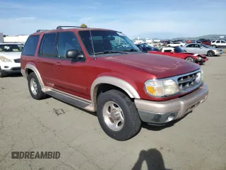 2000 Ford Explorer Eddie Bauer z VIN 1FMZU74E3YZB27368, wystawiony jako Copart lot #45900545 z przebiegiem 154 651 mil mil oraz Szkoda całkowita • Salvage title. Historia ofert i sprzedaży dostępna na DreamBid. Obrazek 4.
