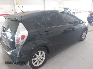 2013 Toyota Prius One z VIN JTDKDTB33D1046251, wystawiony jako IAAI lot #42304087 z przebiegiem 229 655 mil mil oraz . Historia ofert i sprzedaży dostępna na DreamBid. Obrazek 13.