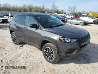 2024 Jeep Compass Trailhawk with VIN 3C4NJDDN7RT156682, listed as a Copart auction lot 50811795 with 8,088 mi miles and Salvage title. Bid and sale history available at DreamBid. Image 4.