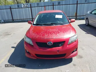 2009 Toyota Corolla with VIN 1NXBU40E09Z098951, listed as a IAAI auction lot 42090512 with 199,787 mi miles. Bid and sale history available at carsss.com. Image 6.