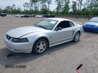 2004 Ford Mustang Standard z VIN 1FAFP40494F117830, wystawiony jako IAAI lot #42212706 z przebiegiem 160 172 mil mil oraz . Historia ofert i sprzedaży dostępna na DreamBid. Obrazek 2.