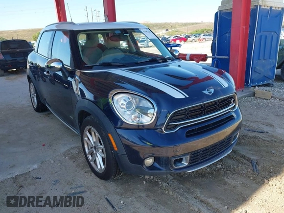 2015 MINI Countryman S z VIN WMWZC5C5XFWP42217, wystawiony jako IAAI lot #41982207 z przebiegiem Nie podano mil oraz . Historia ofert i sprzedaży dostępna na DreamBid. Obrazek 1.