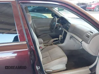 2002 Mazda 626 LX with VIN 1YVGF22C225291987, listed as a IAAI auction lot 41863018 with 111,362 mi miles. Bid and sale history available at carsss.com. Image 5.