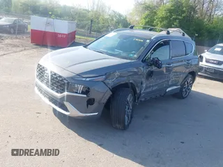 2021 Hyundai Santa Fe Calligraphy with VIN 5NMS5DAL8MH370726, listed as a IAAI auction lot 42099412 with 56,273 mi miles. Bid and sale history available at carsss.com. Image 2.