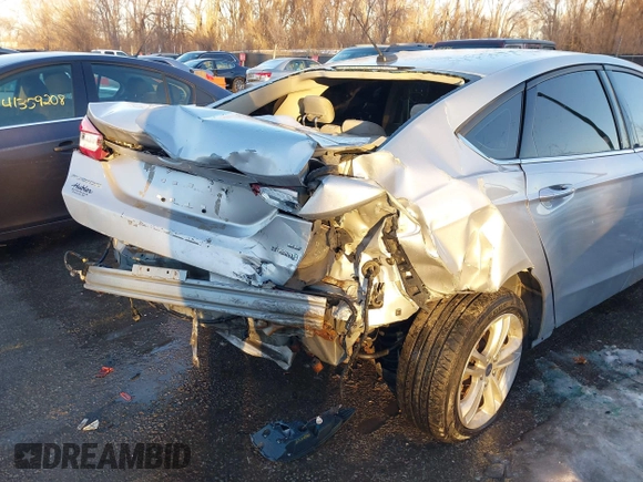 2018 Ford Fusion SE z VIN 3FA6P0LU4JR269064, wystawiony jako IAAI lot #41222967 z przebiegiem 115 077 mil mil oraz . Historia ofert i sprzedaży dostępna na DreamBid. Obrazek 6.
