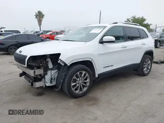 2020 Jeep Cherokee Latitude Plus with VIN 1C4PJLLB8LD601289, listed as a IAAI auction lot 42725984 with 121,533 mi miles and . Bid and sale history available at DreamBid. Image 2.