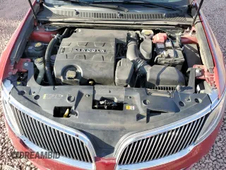 2013 Lincoln MKS z VIN 1LNHL9DK2DG618326, wystawiony jako Copart lot #56875965 z przebiegiem 150 812 mil mil oraz Szkoda całkowita • Salvage title. Historia ofert i sprzedaży dostępna na DreamBid. Obrazek 11.