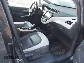 2021 Chevrolet Bolt EV Premier z VIN 1G1FZ6S09M4113694, wystawiony jako IAAI lot #41378289 z przebiegiem 40 979 mil mil oraz . Historia ofert i sprzedaży dostępna na DreamBid. Obrazek 5.