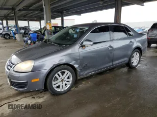 2007 Volkswagen Jetta z VIN 3VWDG71K47M101262, wystawiony jako Copart lot #51469695 z przebiegiem 241 174 mil mil oraz Szkoda całkowita • Salvage title. Historia ofert i sprzedaży dostępna na DreamBid. Obrazek 1.