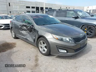 2014 Kia Optima LX with VIN 5XXGM4A77EG349717, listed as a IAAI auction lot 42655167 with 144,193 mi miles and . Bid and sale history available at DreamBid. Image 1.