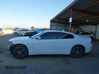2019 Dodge Charger SXT with VIN 2C3CDXJG1KH533323, listed as a IAAI auction lot 41369282 with 102,467 mi miles and . Bid and sale history available at DreamBid. Image 15.