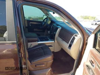 2015 Ram 1500 Big Horn with VIN 3C6RR7LT5FG597847, listed as a IAAI auction lot 42042971 with 212,541 mi miles and . Bid and sale history available at DreamBid. Image 5.
