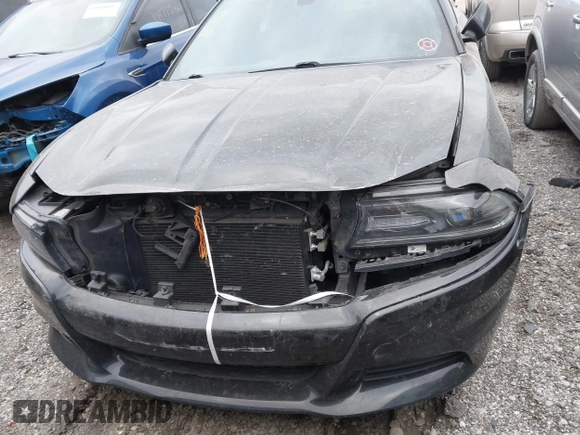 2015 Dodge Charger SE with VIN 2C3CDXBG7FH841469, listed as a IAAI auction lot 42001599 with 103,342 mi miles and . Bid and sale history available at DreamBid. Image 12.