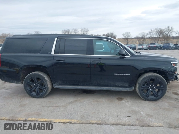 2019 Chevrolet Suburban LT with VIN 1GNSKHKC7KR192984, listed as a IAAI auction lot 41833683 with 176,406 mi miles and . Bid and sale history available at DreamBid. Image 13.