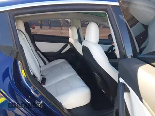2020 Tesla Model 3 Performance z VIN 5YJ3E1ECXLF641945, wystawiony jako IAAI lot #41337826 z przebiegiem 53 336 mil mil oraz . Historia ofert i sprzedaży dostępna na DreamBid. Obrazek 8.