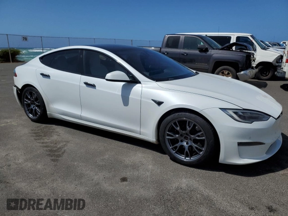 2021 Tesla Model S Plaid с VIN 5YJSA1E66MF453717, выставлен на аукционе Copart как лот 49330355 с пробегом 64 458 миль миль и Списание • Salvage title. История ставок и продаж доступна на DreamBid. Изображение 4.