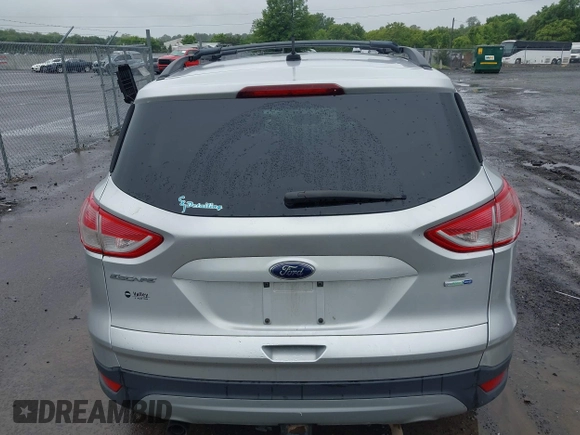 2013 Ford Escape SE with VIN 1FMCU9G94DUC52497, listed as a IAAI auction lot 42352704 with 194,648 mi miles and . Bid and sale history available at DreamBid. Image 17.