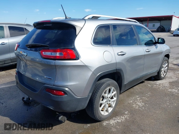 2015 Jeep Cherokee Latitude with VIN 1C4PJLCB8FW620336, listed as a IAAI auction lot 41634997 with 130,335 mi miles. Bid and sale history available at carsss.com. Image 4.