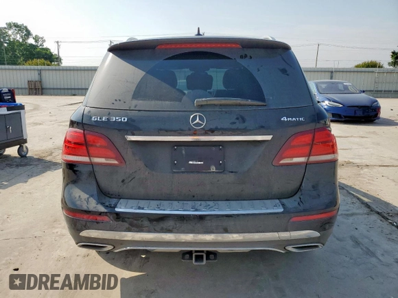 2018 Mercedes-Benz GLE 350 with VIN 4JGDA5HB6JB065910, listed as a Copart auction lot 57254925 with 59,584 mi miles and Salvage title. Bid and sale history available at DreamBid. Image 6.