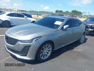 2023 Cadillac CT5 Luxury z VIN 1G6DW5RK3P0106764, wystawiony jako IAAI lot #42491584 z przebiegiem 32 223 mil mil oraz . Historia ofert i sprzedaży dostępna na DreamBid. Obrazek 2.
