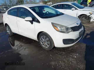 2013 Kia Rio LX with VIN KNADM4A37D6240703, listed as a IAAI auction lot 41938543 with 221,111 mi miles. Bid and sale history available at carsss.com. Image 1.
