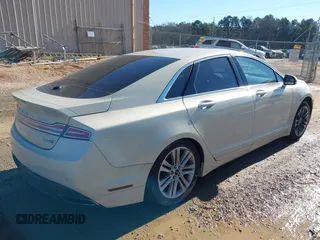 2016 Lincoln MKZ z VIN 3LN6L2J94GR611830, wystawiony jako IAAI lot #41264148 z przebiegiem 155 065 mil mil oraz . Historia ofert i sprzedaży dostępna na DreamBid. Obrazek 4.