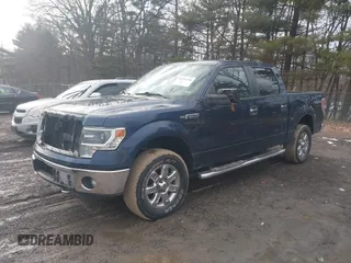 2014 Ford F-150 XL with VIN 1FTFW1EFXEFC89999, listed as a IAAI auction lot 41491284 with 98,569 mi miles. Bid and sale history available at carsss.com. Image 2.