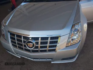 2013 Cadillac CTS Luxury with VIN 1G6DE5E52D0156666, listed as a IAAI auction lot 42058687 with 120,659 mi miles and . Bid and sale history available at DreamBid. Image 6.