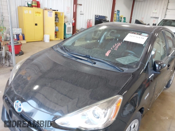 2016 Toyota Prius c One with VIN JTDKDTB3XG1124674, listed as a IAAI auction lot 41976438 with 72,028 mi miles. Bid and sale history available at carsss.com. Image 6.