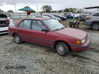1990 Mazda Protege z VIN JM1BG2246L0167483, wystawiony jako Copart lot #48603295 z przebiegiem 170 461 mil mil oraz Czysty tytuł • Clean title. Historia ofert i sprzedaży dostępna na DreamBid. Obrazek 4.
