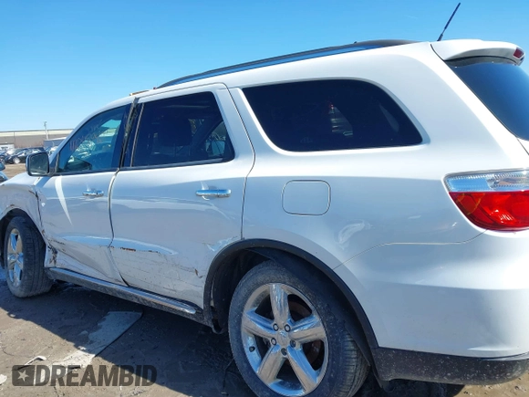 2013 Dodge Durango Citadel z VIN 1C4RDJEG6DC638023, wystawiony jako IAAI lot #41761307 z przebiegiem 405 864 mil mil oraz . Historia ofert i sprzedaży dostępna na DreamBid. Obrazek 14.