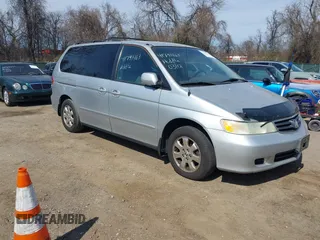 2002 Honda Odyssey EX-L z VIN 2HKRL18072H578983, wystawiony jako IAAI lot #41791463 z przebiegiem 197 287 mil mil oraz . Historia ofert i sprzedaży dostępna na DreamBid. Obrazek 1.