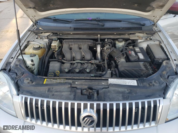 2005 Mercury Montego Premier with VIN 1MEFM43165G608323, listed as a Copart auction lot 77156404 with 138,150 mi miles and Salvage Title. Bid and sale history available at carsss.com. Image 12.