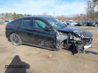 2022 BMW X4 M40i with VIN 5UX43DT0XN9L33898, listed as a IAAI auction lot 41642374 with 8 mi miles and . Bid and sale history available at DreamBid. Image 13.