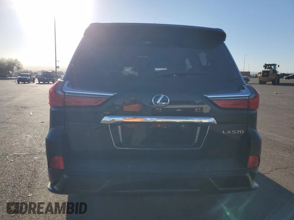 2020 Lexus LX 570 z VIN JTJDY7AX1L4332179, wystawiony jako Copart lot #77017714 z przebiegiem 49 756 mil mil oraz Szkoda całkowita • Salvage title. Historia ofert i sprzedaży dostępna na DreamBid. Obrazek 6.