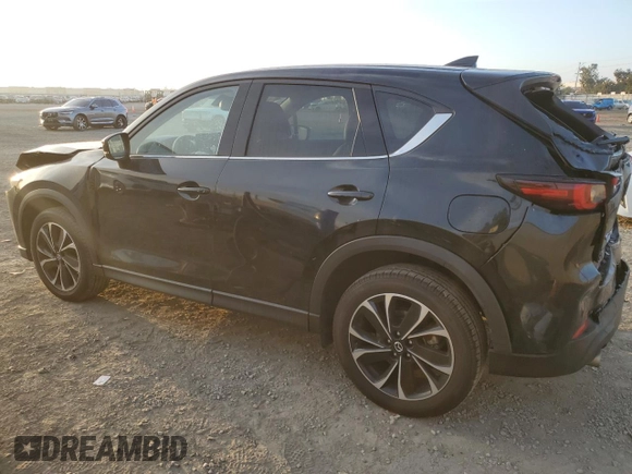 2023 Mazda CX-5 2.5 S Premium Plus Package with VIN JM3KFBEM7P0170811, listed as a Copart auction lot 87335674 with 43,799 mi miles and Salvage Title. Bid and sale history available at carsss.com. Image 2.