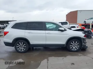 2021 Honda Pilot EX-L with VIN 5FNYF6H55MB031305, listed as a IAAI auction lot 41476636 with 58,754 mi miles. Bid and sale history available at carsss.com. Image 14.
