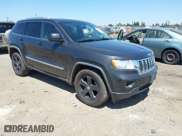 2011 Jeep Grand Cherokee Laredo with VIN 1J4RR4GG7BC715778, listed as a IAAI auction lot 42313636 with 249,209 mi miles and . Bid and sale history available at DreamBid. Image 1.