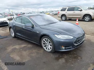 2016 Tesla Model S 90D with VIN 5YJSA1E27GF129824, listed as a IAAI auction lot 42058080 with 113,171 mi miles and . Bid and sale history available at DreamBid. Image 1.