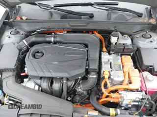 2022 Hyundai Sonata Hybrid Blue with VIN KMHL24JJ2NA048439, listed as a IAAI auction lot 40942477 with 64,855 mi miles. Bid and sale history available at carsss.com. Image 10.