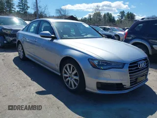 2016 Audi A6 2.0T Premium Plus with VIN WAUGFAFC2GN084384, listed as a IAAI auction lot 42040575 with 97,425 mi miles. Bid and sale history available at carsss.com. Image 1.