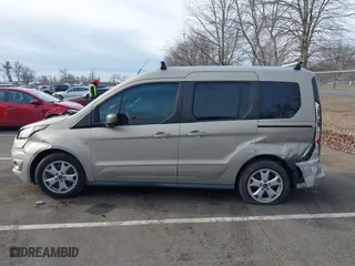 2015 Ford Transit Connect Wagon XLT with VIN NM0AE8F74F1179538, listed as a IAAI auction lot 41505221 with 57,798 mi miles. Bid and sale history available at carsss.com. Image 14.