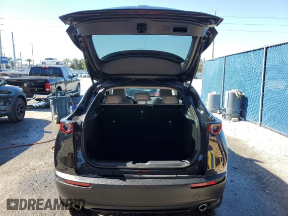 2023 Mazda CX-30 S Carbon Edition with VIN 3MVDMBCM8PM517987, listed as a Copart auction lot 43248925 with 10,009 mi miles and Non Repairable. Bid and sale history available at carsss.com. Image 6.