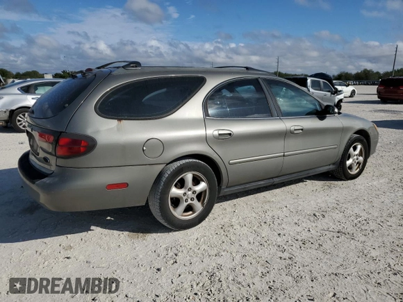 2003 Ford Taurus SE Standard with VIN 1FAFP58U33A259080, listed as a Copart auction lot 86819024 with 143,482 mi miles and Salvage Title. Bid and sale history available at carsss.com. Image 3.