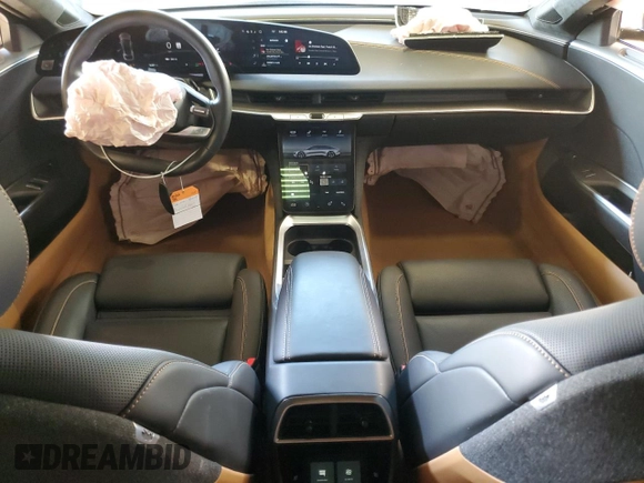 2023 Lucid Air Touring z VIN 50EA1TEA7PA003630, wystawiony jako Copart lot #50743355 z przebiegiem 9357 mil mil oraz Szkody całkowita. Historia ofert i sprzedaży dostępna na DreamBid. Obrazek 8.
