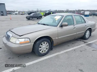 2004 Mercury Grand Marquis LS Premium z VIN 2MEFM75W14X643516, wystawiony jako IAAI lot #42007171 z przebiegiem 213 531 mil mil oraz . Historia ofert i sprzedaży dostępna na DreamBid. Obrazek 17.