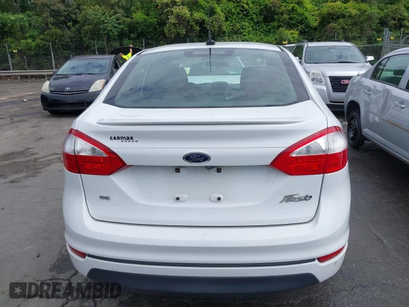 2019 Ford Fiesta SE z VIN 3FADP4BJ2KM143337, wystawiony jako IAAI lot #42179937 z przebiegiem 124 078 mil mil oraz . Historia ofert i sprzedaży dostępna na DreamBid. Obrazek 16.